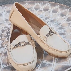 Coach white leather loafers in excellent condition. Size 9.5b. Silver hardware